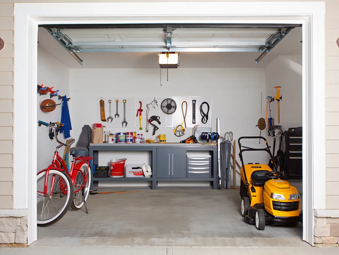 Organized garage with wall storage and clear zones